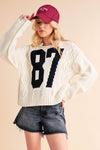 White 87 Cable Knit Sweater